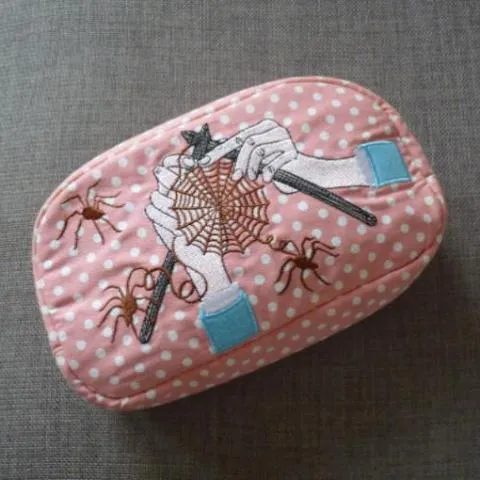 A Knitted Web cosmetic bag