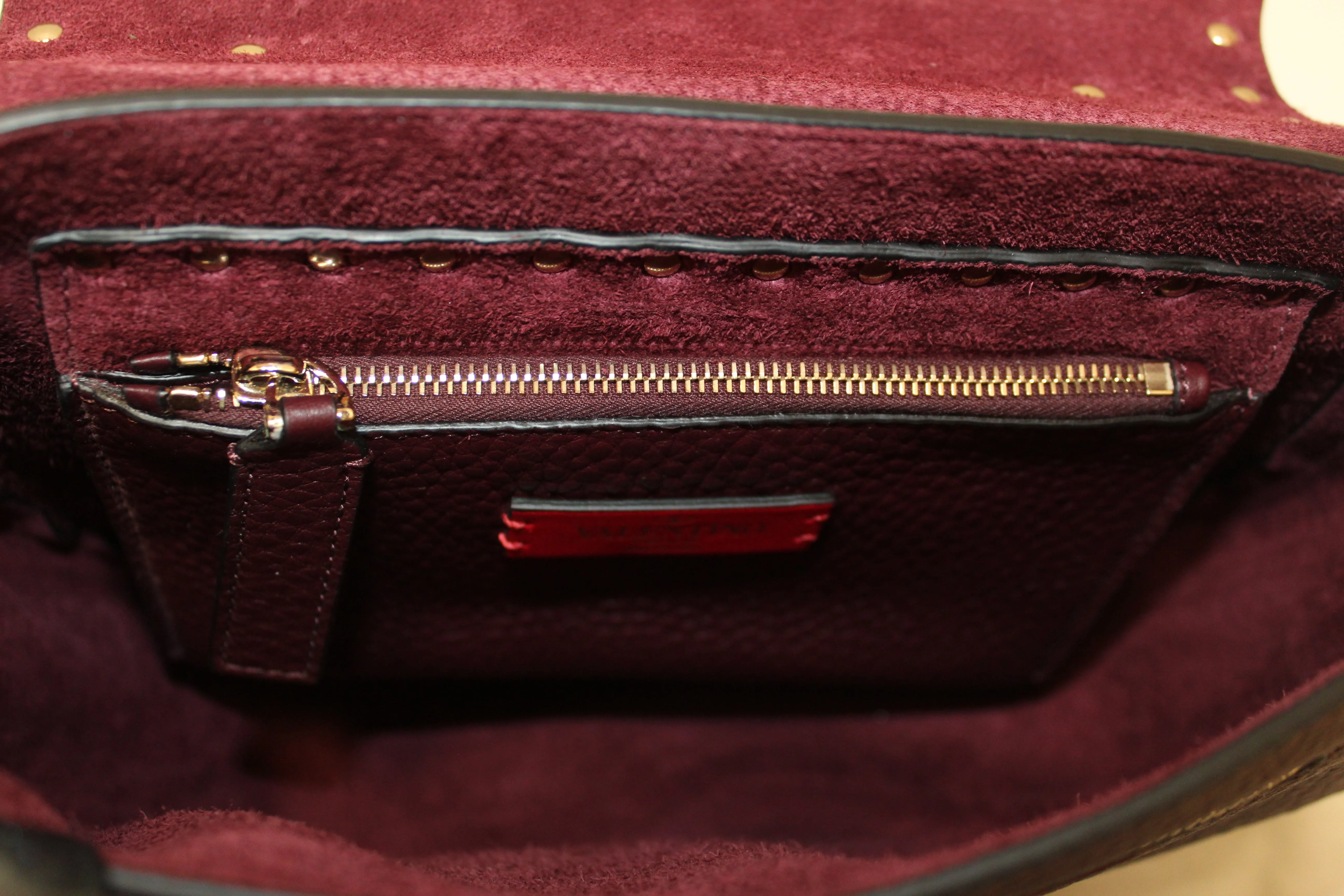 Authentic NEW Valentino Garavani Burgundy Pebbled Calfskin Rockstud Haftmoon Saddle Bag