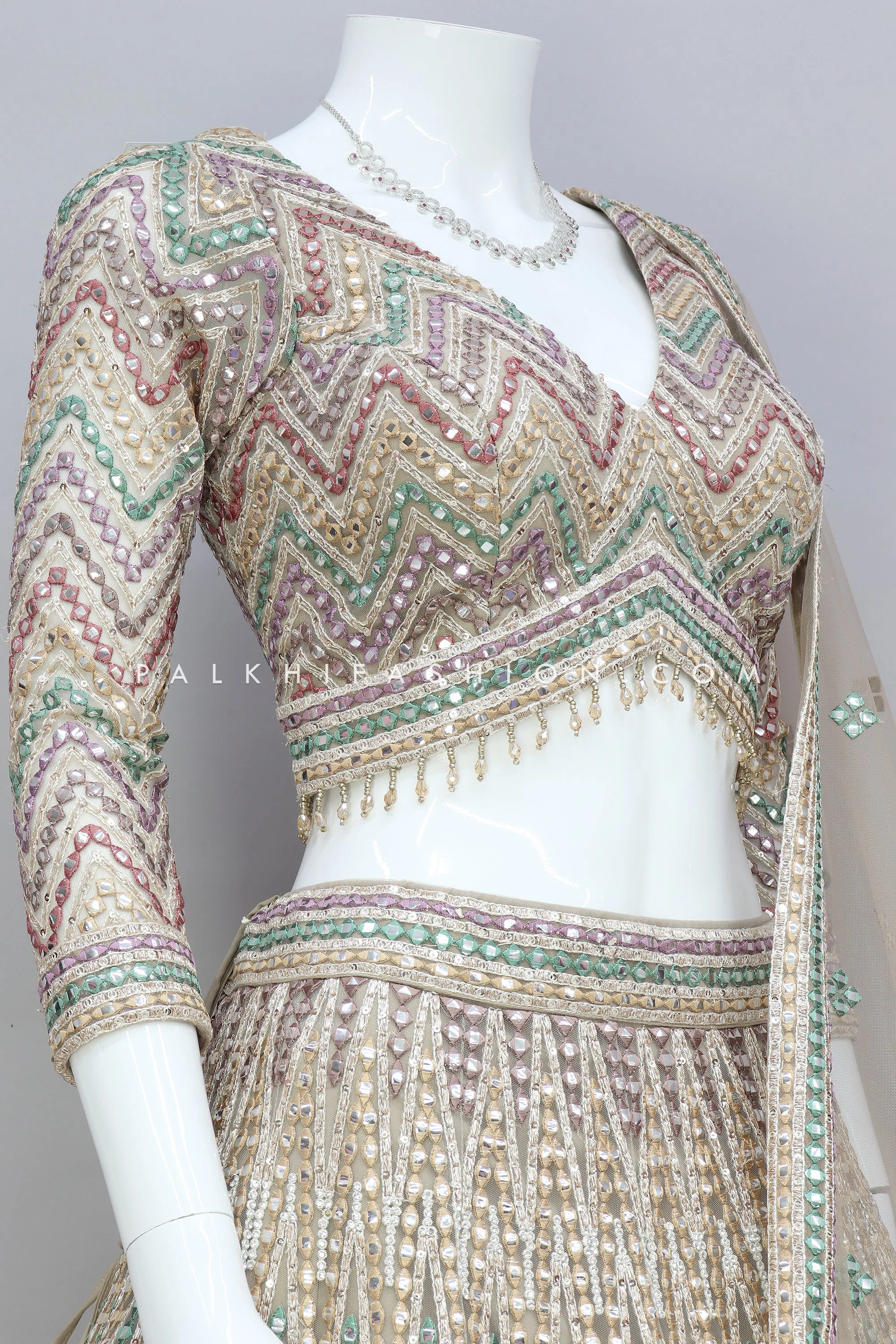 Designer Ivory Gold Lehenga Choli With Exquisite Work