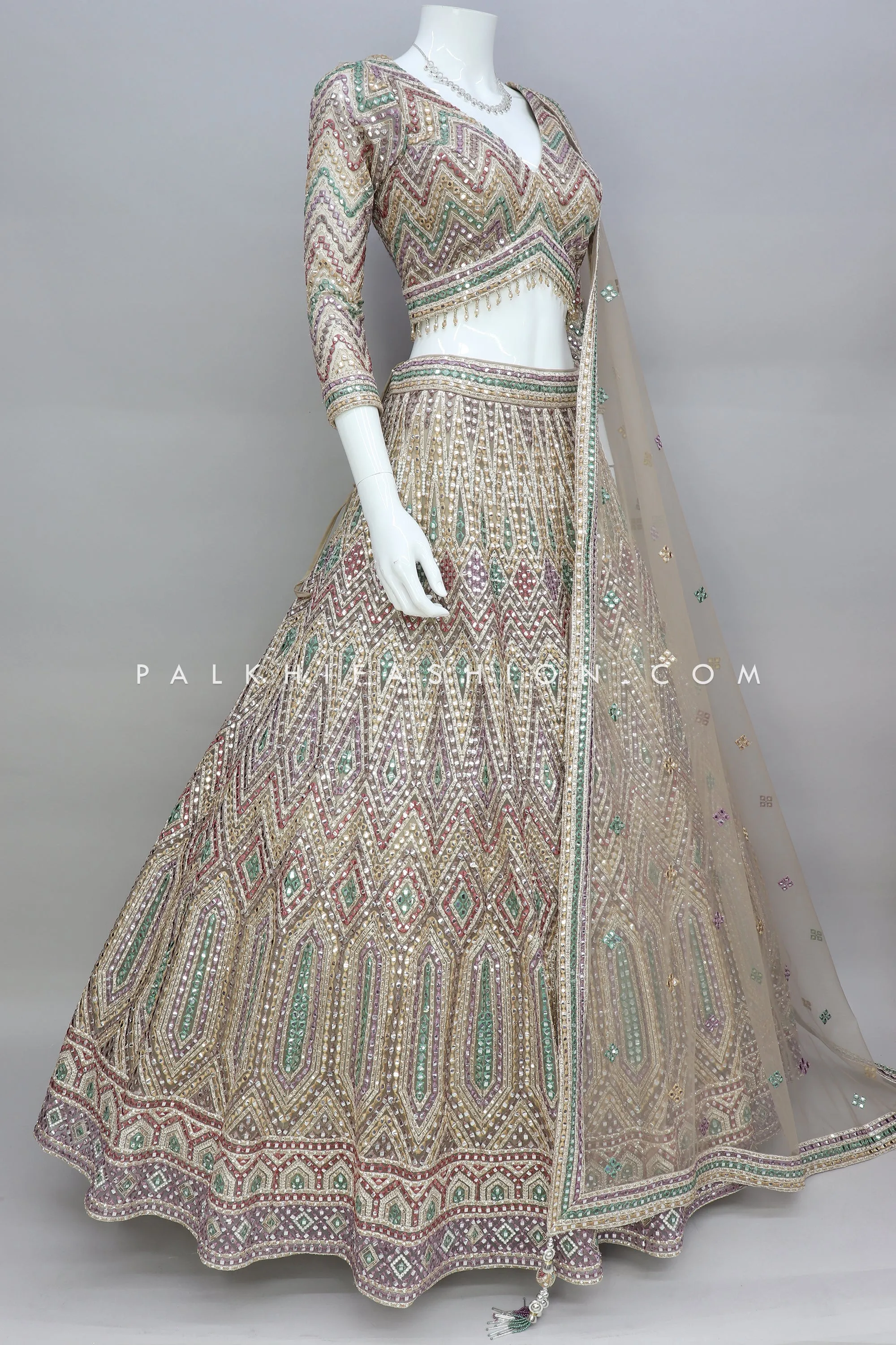 Designer Ivory Gold Lehenga Choli With Exquisite Work
