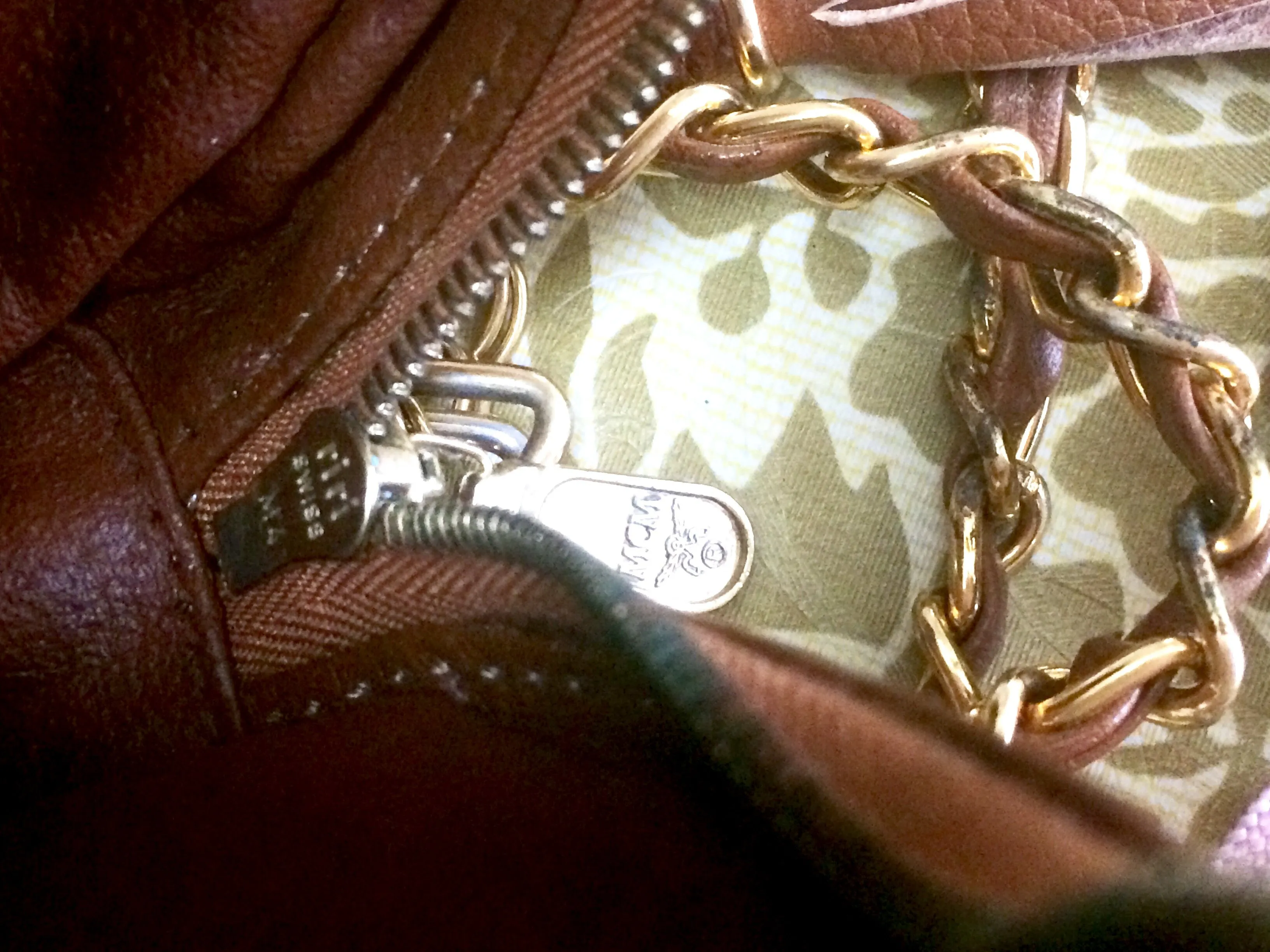 Vintage MCM brown leather round mini Suzy Wong shoulder bag with golden logo motifs. trimmings. Designed by Michael Cromer.