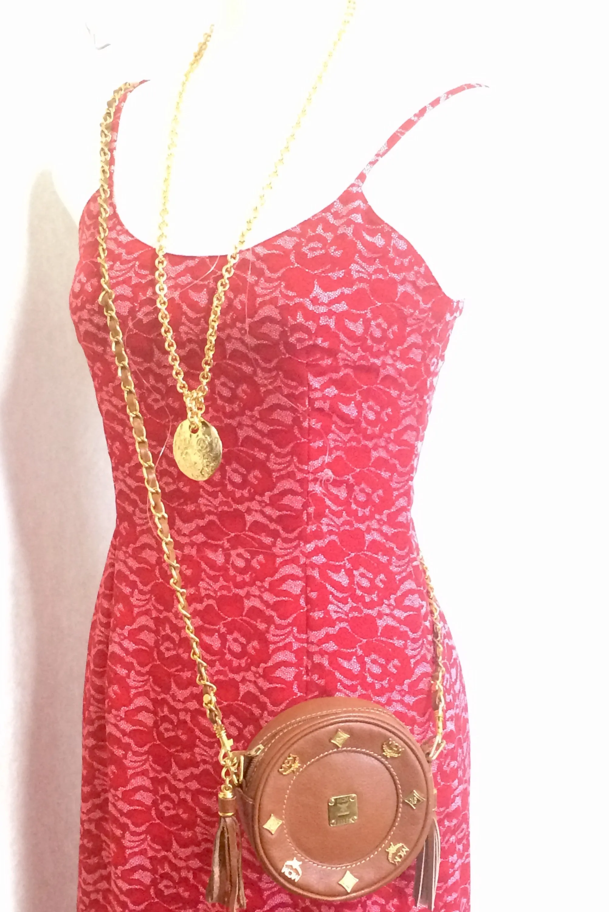 Vintage MCM brown leather round mini Suzy Wong shoulder bag with golden logo motifs. trimmings. Designed by Michael Cromer.